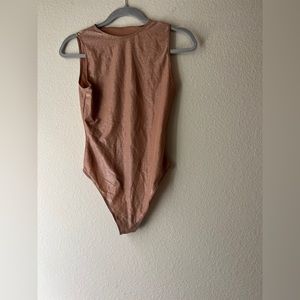Skims bodysuit new with some tags